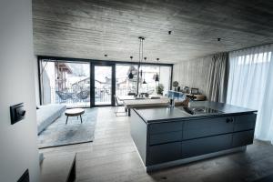 Posezení v ubytování Glanz & Glory Appartements Längenfeld