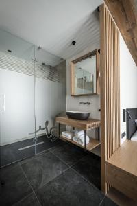 Postel nebo postele na pokoji v ubytování Glanz & Glory Appartements Längenfeld