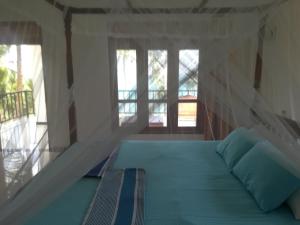 Postel nebo postele na pokoji v ubytování Star Beach Hotel