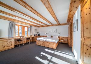 Un pat sau paturi într-o cameră la Hotel Stoffel - adults only