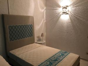 Postel nebo postele na pokoji v ubytování Hotel Canne al Vento