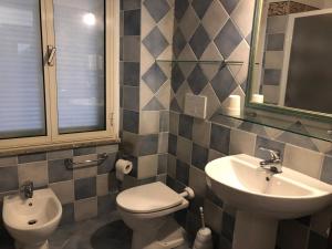 Ванная комната в Hotel Canne al Vento