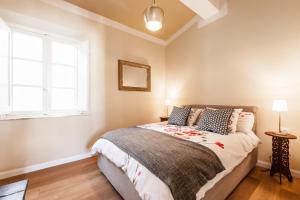 Letto o letti in una camera di Affordable suite with a view in the Heart of Lucca