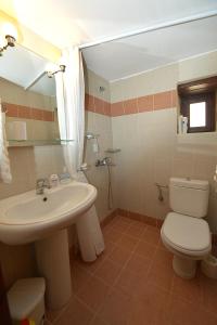 A bathroom at Rosalia Apartments
