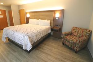 Hotel LeBlanc Best Western Signature Collection客房内的一张或多张床位