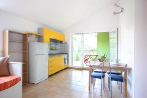 Kuchyň nebo kuchyňský kout v ubytování Apartments Kala mendula