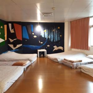 Postel nebo postele na pokoji v ubytování 太魯閣蘇西小空間 SusiSpace