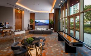 TV a/nebo společenská místnost v ubytování Luxury Beach Resort