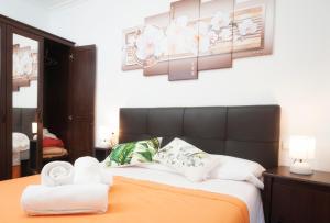 Posteľ alebo postele v izbe v ubytovaní Apartamento Algalia Catedral