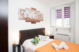 Posteľ alebo postele v izbe v ubytovaní Apartamento Algalia Catedral