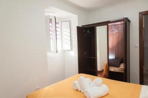 Posteľ alebo postele v izbe v ubytovaní Apartamento Algalia Catedral