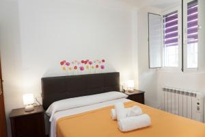 Posteľ alebo postele v izbe v ubytovaní Apartamento Algalia Catedral
