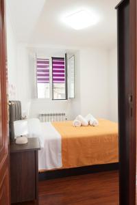 Posteľ alebo postele v izbe v ubytovaní Apartamento Algalia Catedral