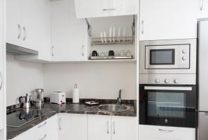 Kuchyňa alebo kuchynka v ubytovaní Apartamento Algalia Catedral