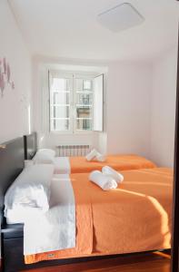 Posteľ alebo postele v izbe v ubytovaní Apartamento Algalia Catedral