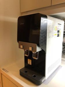 A cozinha ou kitchenette de Homy Residence
