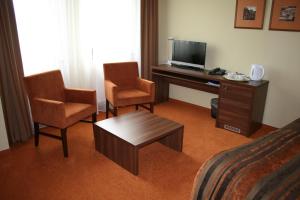 Μια τηλεόραση ή/και κέντρο ψυχαγωγίας στο Hotel BELASSI