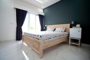 Rúm í herbergi á Vanilla Suite Jimbaran