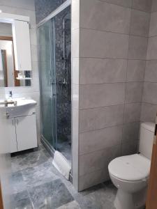 Koupelna v ubytování Atva Residence Hotel