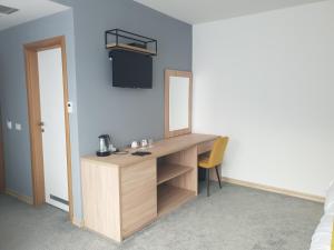 TV a/nebo společenská místnost v ubytování Atva Residence Hotel