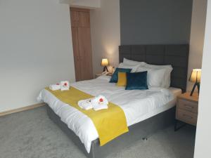 Postel nebo postele na pokoji v ubytování Atva Residence Hotel