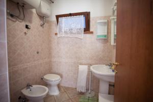 Koupelna v ubytování Residenza Su Prelau