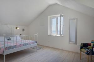 Postel nebo postele na pokoji v ubytování Villa Petit in Brela, private pool