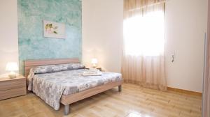 Voodi või voodid majutusasutuse Apartment Mikao - Torre Pali toas