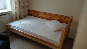 Posteľ alebo postele v izbe v ubytovaní Hotel Śnieżnik