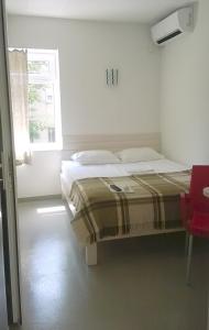 Cama o camas de una habitación en Terrazzo