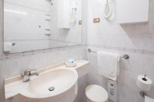 Koupelna v ubytování Hotel Astor Victoria