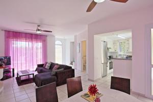 a living room with a couch and a table at Villa Irina Polis in Polis Chrysochous