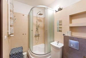 Kúpeľňa v ubytovaní Apartament Zaciszny