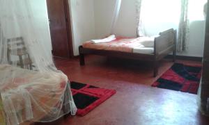 Letto o letti in una camera di Skyway Hotel