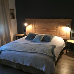 Postel nebo postele na pokoji v ubytování Chambres d'hôtes L'Ecrin des Saveurs