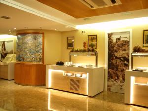 Lobbyn eller receptionsområdet på Hotel Guillem & Spa