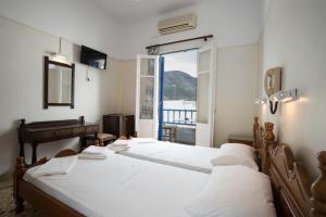 Posteľ alebo postele v izbe v ubytovaní Hotel Sofia