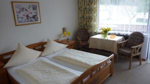 Postel nebo postele na pokoji v ubytování Pension Brix + 37 fotografií