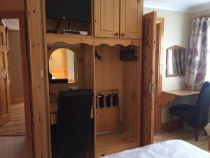 Ένα ή περισσότερα κρεβάτια σε δωμάτιο στο Algret House B&B