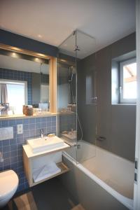 Baðherbergi á Boutique Hotel Reschen