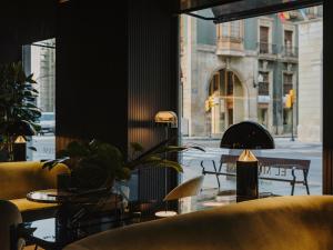 Uma área de estar em El Môderne Hotel