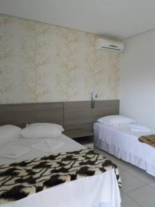 Katil atau katil-katil dalam bilik di Star Hotel