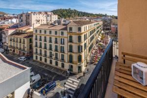 Nespecifikovaný výhled na destinaci Málaga nebo výhled na město při pohledu z apartmánu