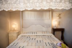 A bed or beds in a room at San Giovanni In Poggio