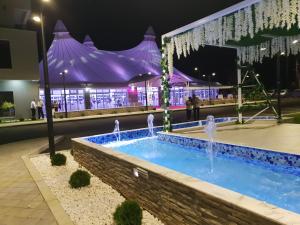 Bazén v ubytování Atva Residence Hotel nebo v jeho okolí
