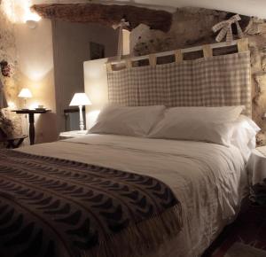 Cama o camas de una habitación en Chambres d'Hôtes Cal Miquel