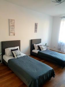 Postel nebo postele na pokoji v ubytování Apartament AltePost