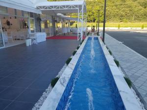 Bazén v ubytování Atva Residence Hotel nebo v jeho okolí