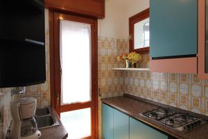 A kitchen or kitchenette at Villa Agavi