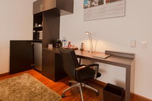 Kuchyň nebo kuchyňský kout v ubytování Hotel Jazz Apartments